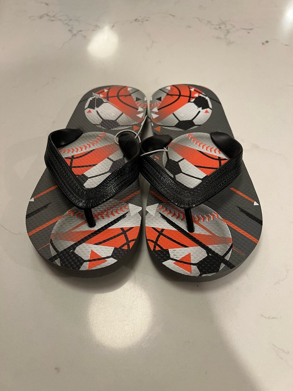NWOT Boys Spots themed flip flops size 1/2